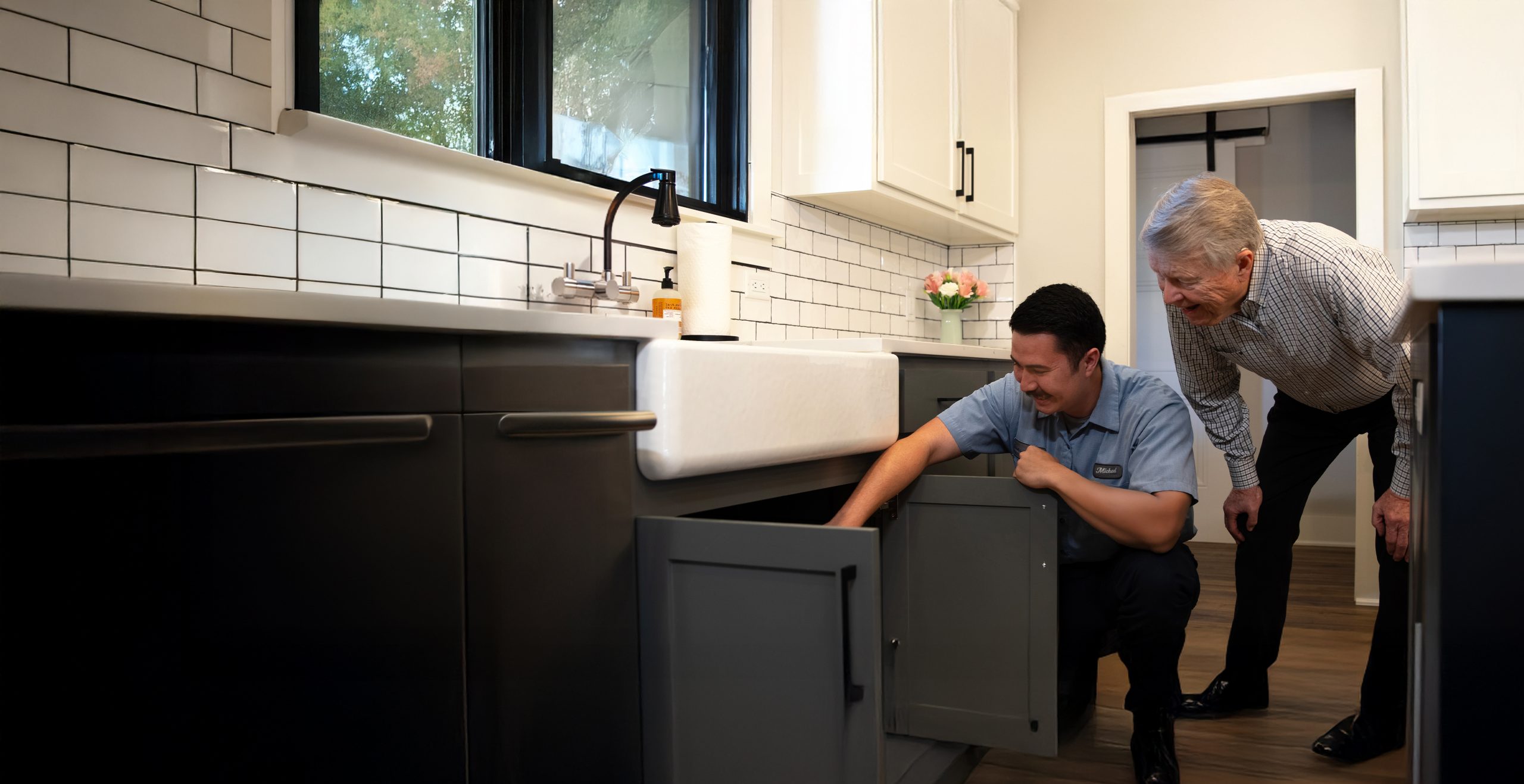 Licensed Paschal plumber at an outdoor unit